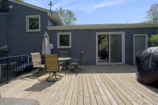 8683 Hemlock Ct, Ypsilanti, MI 48198 - deck with outdoor dining area