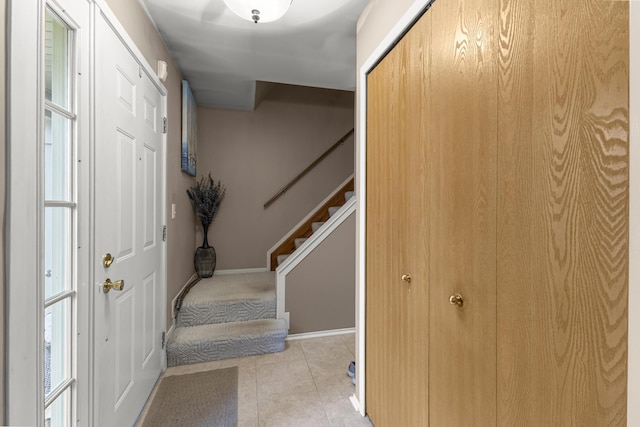 24663 Balsam Ct, Flat Rock, MI 48134 - foyer with stairway and light tile patterned floors