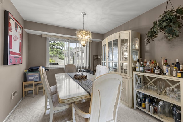 24663 Balsam Ct, Flat Rock, MI 48134 - dining space featuring light colored carpet and a chandelier
