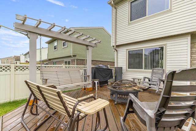 24663 Balsam Ct, Flat Rock, MI 48134 - deck featuring a fire pit