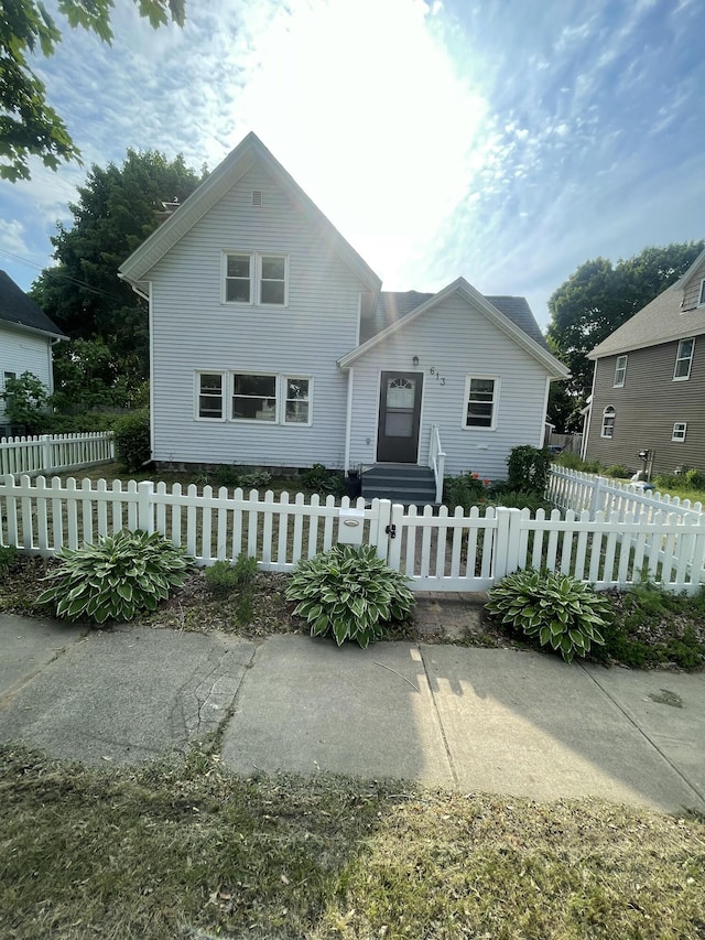 613 James St, Belding, MI 48809 - traditional-style home featuring a fenced front yard