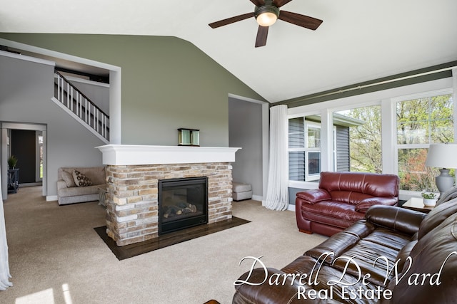 3940 Egypt Valley Ave NE, Ada, MI 49301 - living room with ceiling fan, carpet, a brick fireplace, and high vaulted ceiling