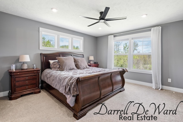 3940 Egypt Valley Ave NE, Ada, MI 49301 - bedroom with multiple windows, light carpet, a ceiling fan, and recessed lighting