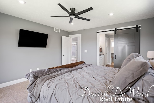 3940 Egypt Valley Ave NE, Ada, MI 49301 - bedroom featuring a barn door, carpet, recessed lighting, ceiling fan, and ensuite bath