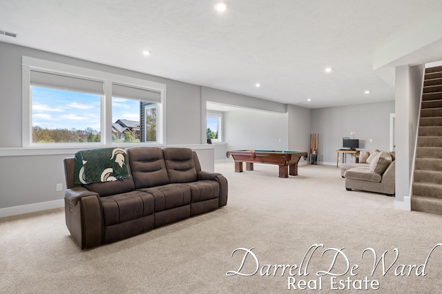 3940 Egypt Valley Ave NE, Ada, MI 49301 - carpeted living area with stairs, recessed lighting, billiards, and plenty of natural light