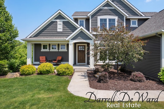3940 Egypt Valley Ave NE, Ada, MI 49301 - craftsman-style home featuring a front yard and a shingled roof