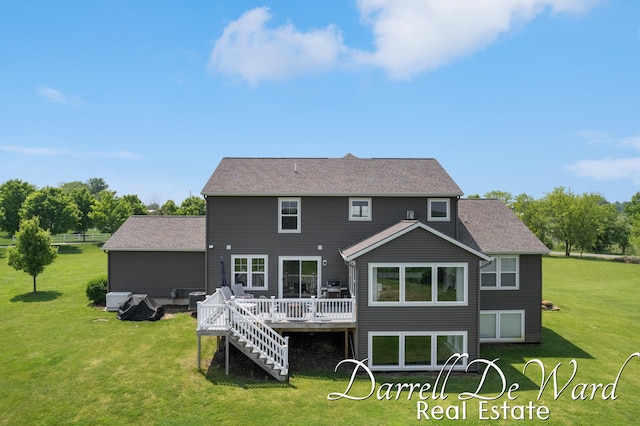 3940 Egypt Valley Ave NE, Ada, MI 49301 - rear view of house featuring a wooden deck, a yard, and roof with shingles