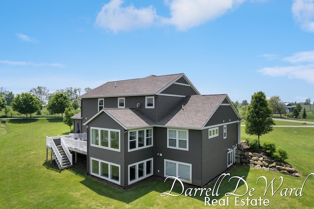 3940 Egypt Valley Ave NE, Ada, MI 49301 - back of property featuring roof with shingles, a lawn, and a wooden deck
