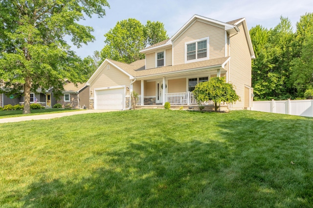 1481 Kristen Path, Saint Joseph, MI 49085 - traditional-style home with a porch, a garage, driveway, and stone siding