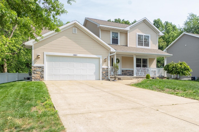 1481 Kristen Path, Saint Joseph, MI 49085 - view of front of home with a porch, stone siding, a garage, driveway, and a shingled roof