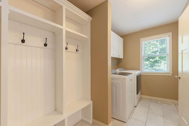 1481 Kristen Path, Saint Joseph, MI 49085 - laundry area with washing machine and dryer and cabinet space