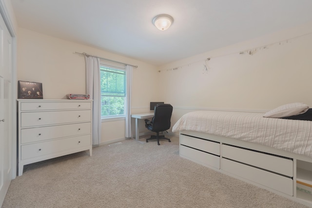 1481 Kristen Path, Saint Joseph, MI 49085 - bedroom with light colored carpet and an office area