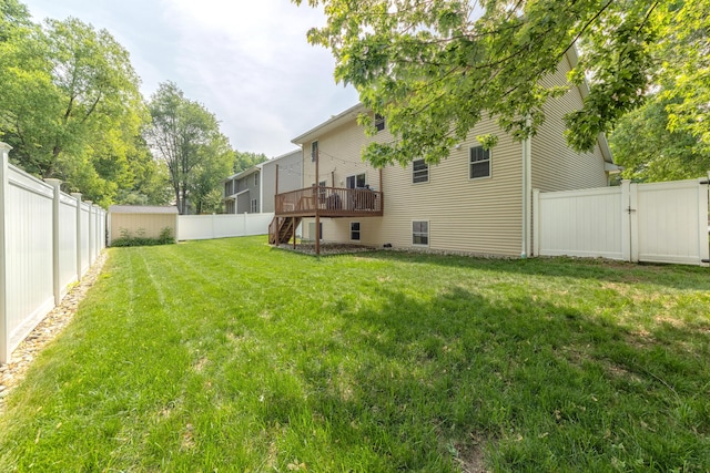 1481 Kristen Path, Saint Joseph, MI 49085 - fenced backyard featuring stairway, a deck, and a gate