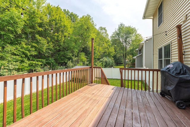 1481 Kristen Path, Saint Joseph, MI 49085 - wooden terrace featuring grilling area and a fenced backyard