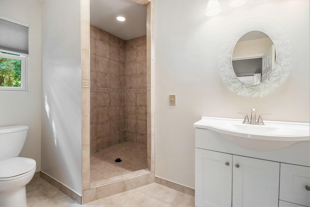 9510 Pere Marquette Dr, Canadian Lakes, MI 49346 - bathroom with tile patterned flooring, vanity, and tiled shower