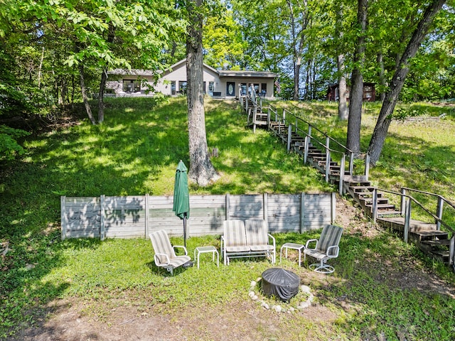 9898 S Pritchard Dr, Stanwood, MI 49346 - view of grassy yard featuring stairs