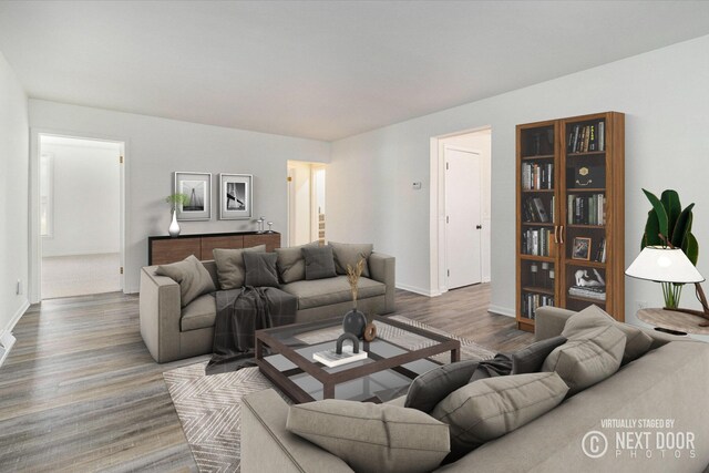 922 Marion Ave, Big Rapids, MI 49307 - living area with wood finished floors and baseboards