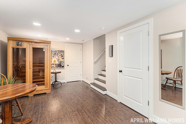740 Van Raalte Ave, Holland, MI 49423 - hallway featuring dark wood-style floors, stairs, and recessed lighting