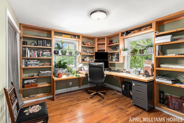 740 Van Raalte Ave, Holland, MI 49423 - office featuring wood finished floors, healthy amount of natural light, and built in desk