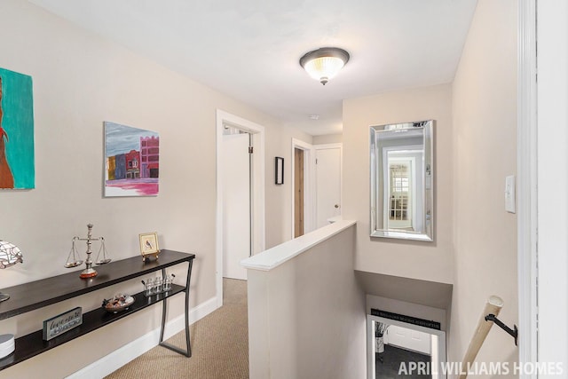 740 Van Raalte Ave, Holland, MI 49423 - corridor featuring an upstairs landing and carpet flooring
