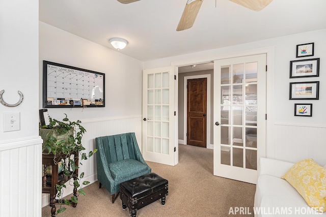 740 Van Raalte Ave, Holland, MI 49423 - sitting room featuring french doors, wainscoting, carpet, and a ceiling fan