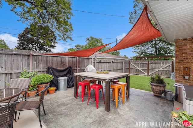 740 Van Raalte Ave, Holland, MI 49423 - fenced backyard featuring outdoor dining area and a patio