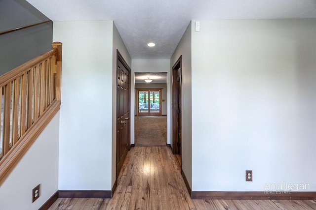 3192 W Sisson Rd, Freeport, MI 49325 - hallway with baseboards and wood finished floors