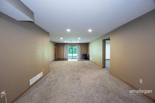 3192 W Sisson Rd, Freeport, MI 49325 - empty room featuring recessed lighting and carpet
