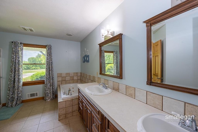 3192 W Sisson Rd, Freeport, MI 49325 - full bathroom featuring a bath, tile patterned floors, and double vanity