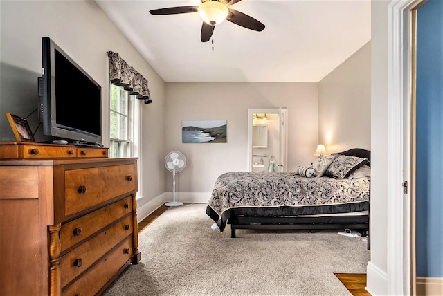 14011 Verona Rd, Marshall, MI 49068 - carpeted bedroom with ensuite bathroom and ceiling fan