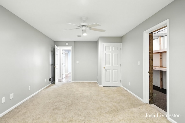 9337 Andrew Farms Dr, Alto, MI 49302 - unfurnished bedroom with carpet floors and ceiling fan