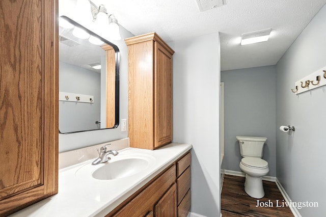 9337 Andrew Farms Dr, Alto, MI 49302 - bathroom featuring wood finished floors and vanity