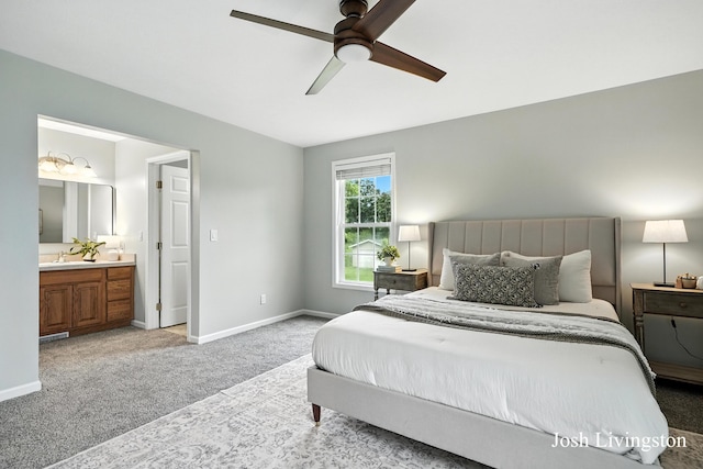 9337 Andrew Farms Dr, Alto, MI 49302 - bedroom with light carpet, ensuite bathroom, and a ceiling fan