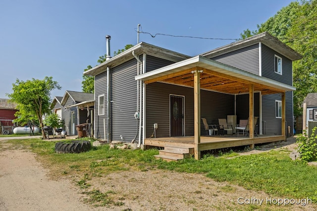 4555 Charles St, Palo, MI 48870 - back of property with a wooden deck