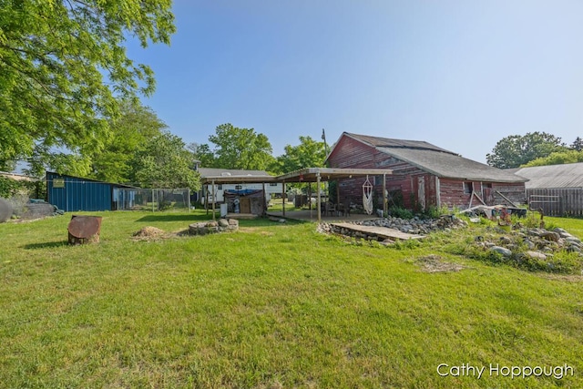 4555 Charles St, Palo, MI 48870 - view of green lawn featuring an outdoor structure