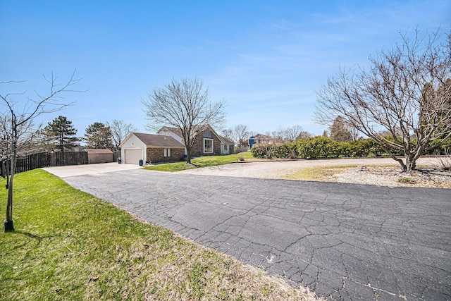 3189 Textile Rd, Saline, MI 48176 - view of front of home featuring concrete driveway and a garage