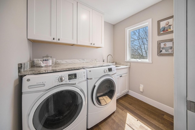 3189 Textile Rd, Saline, MI 48176 - laundry room with separate washer and dryer, cabinet space, and dark wood-style floors