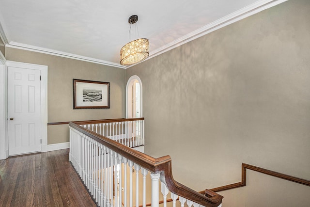 60 Lafayette Ave NE, Grand Rapids, MI 49503 - hall featuring wood finished floors, a chandelier, crown molding, and arched walkways