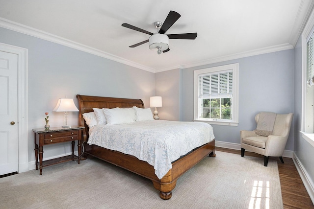 60 Lafayette Ave NE, Grand Rapids, MI 49503 - bedroom with ornamental molding, wood finished floors, and ceiling fan
