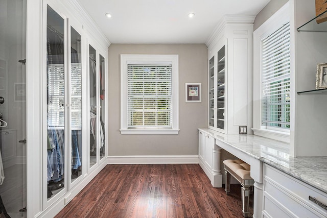 60 Lafayette Ave NE, Grand Rapids, MI 49503 - unfurnished dining area featuring dark wood-style flooring, built in desk, and recessed lighting