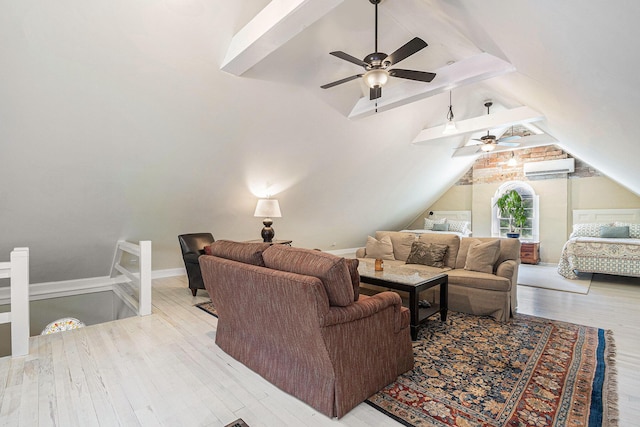 60 Lafayette Ave NE, Grand Rapids, MI 49503 - living room with a wall unit AC, ceiling fan, wood finished floors, and a skylight