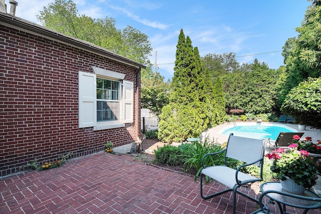60 Lafayette Ave NE, Grand Rapids, MI 49503 - view of patio / terrace with an outdoor pool