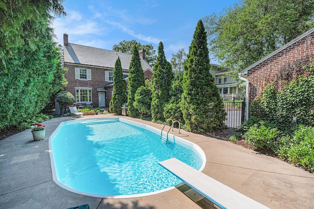 60 Lafayette Ave NE, Grand Rapids, MI 49503 - outdoor pool with a diving board