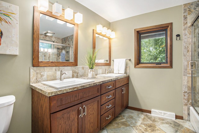 2766 48th Ave, Zeeland, MI 49464 - full bathroom with double vanity and backsplash