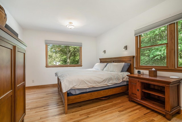 6368 E Lake Ln, Sawyer, MI 49125 - bedroom with light wood-style flooring