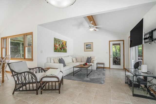 6368 E Lake Ln, Sawyer, MI 49125 - living room with beam ceiling, light tile patterned floors, ceiling fan, and high vaulted ceiling