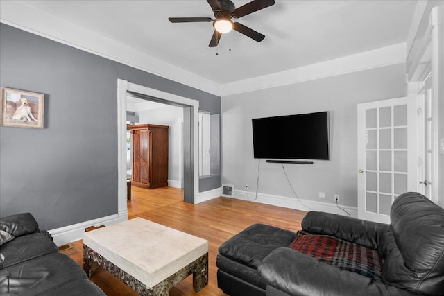 905 Harrison Ave, Saint Joseph, MI 49085 - living room featuring a ceiling fan and light wood-type flooring