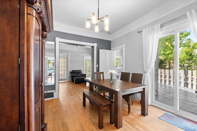 905 Harrison Ave, Saint Joseph, MI 49085 - dining space with plenty of natural light, light wood-style flooring, and a chandelier