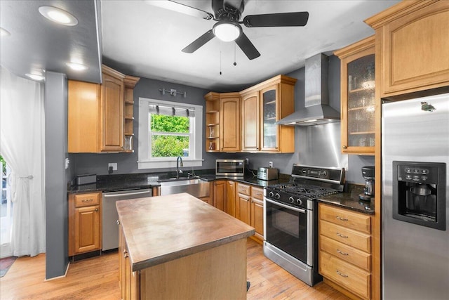 905 Harrison Ave, Saint Joseph, MI 49085 - kitchen with stainless steel appliances, wall chimney range hood, open shelves, light wood finished floors, and recessed lighting