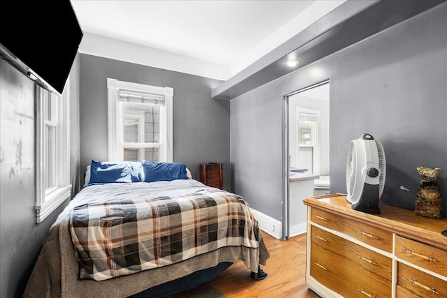905 Harrison Ave, Saint Joseph, MI 49085 - bedroom featuring multiple windows and light wood-style flooring